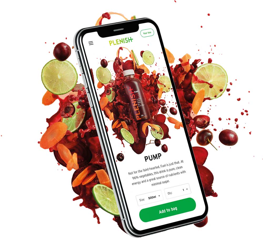 Plenish website on a phone with a burst of fruit around it